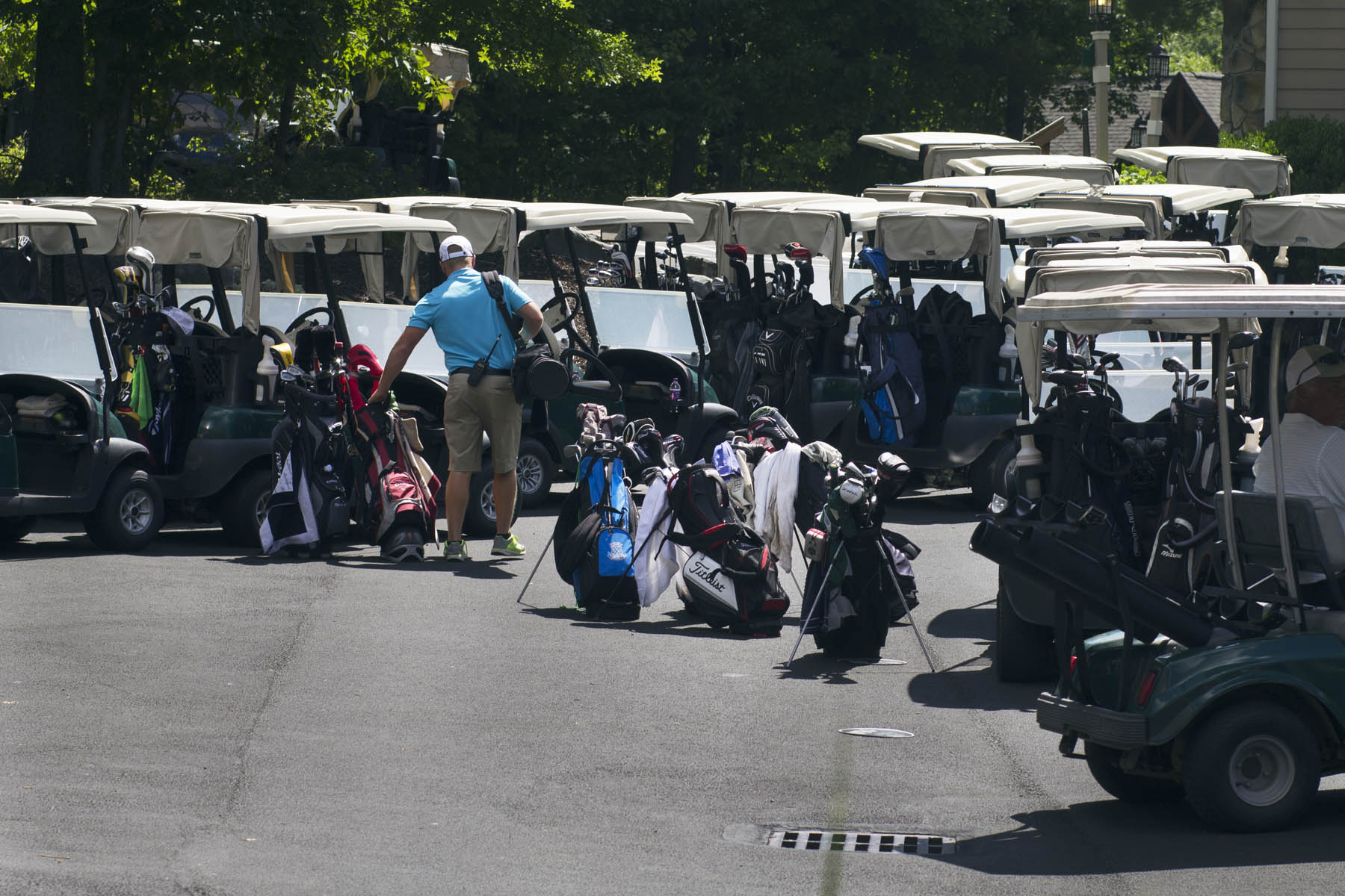 Golf club bags and golf carts.