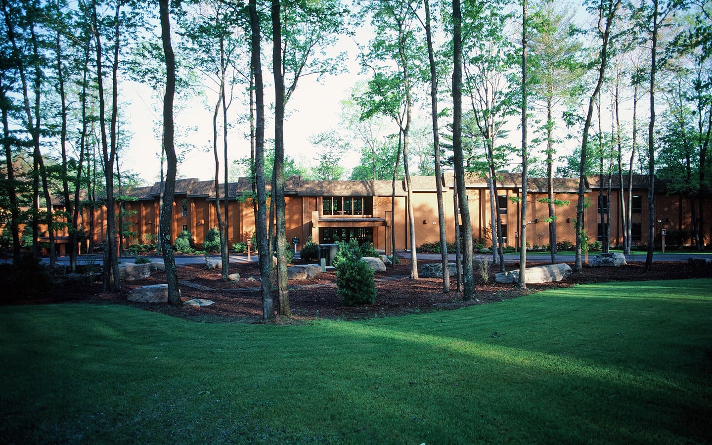 Historic photo of Woodloch resort exterior.