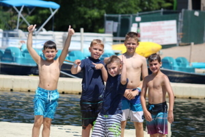 Photo of 5 Kids on a Dock. Now's the Time to Make a Summer Checklist for Kids.