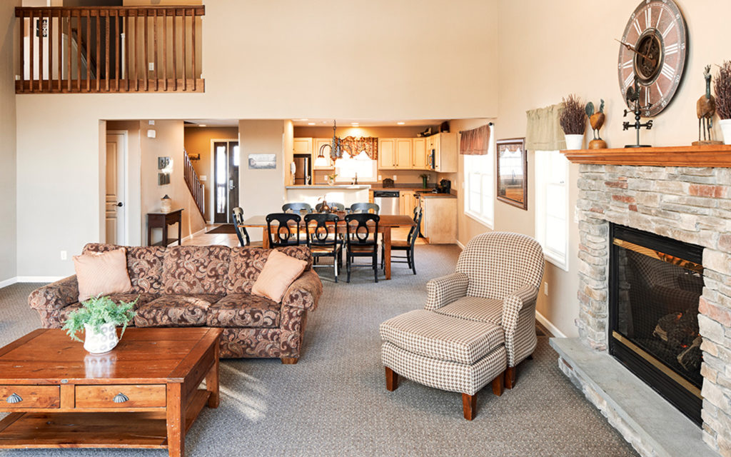 Lake Estate living room with fireplace.