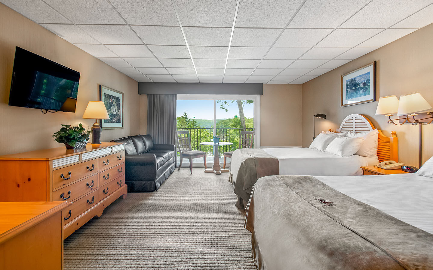 Woodloch guest room with two queen beds.