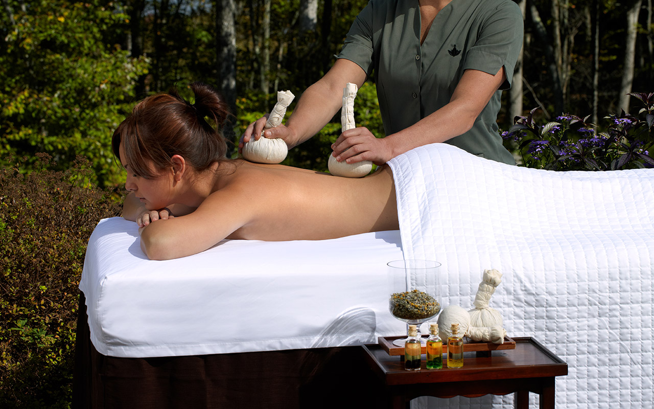 Woman recieving a back massage.