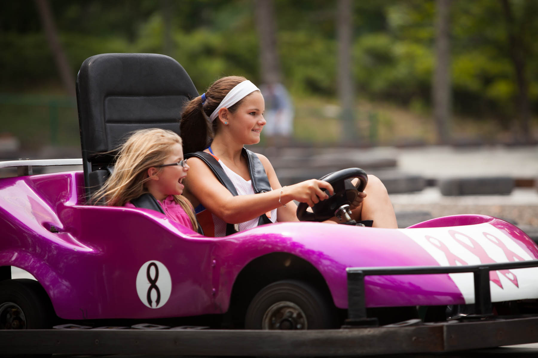 Young women in a gokart.