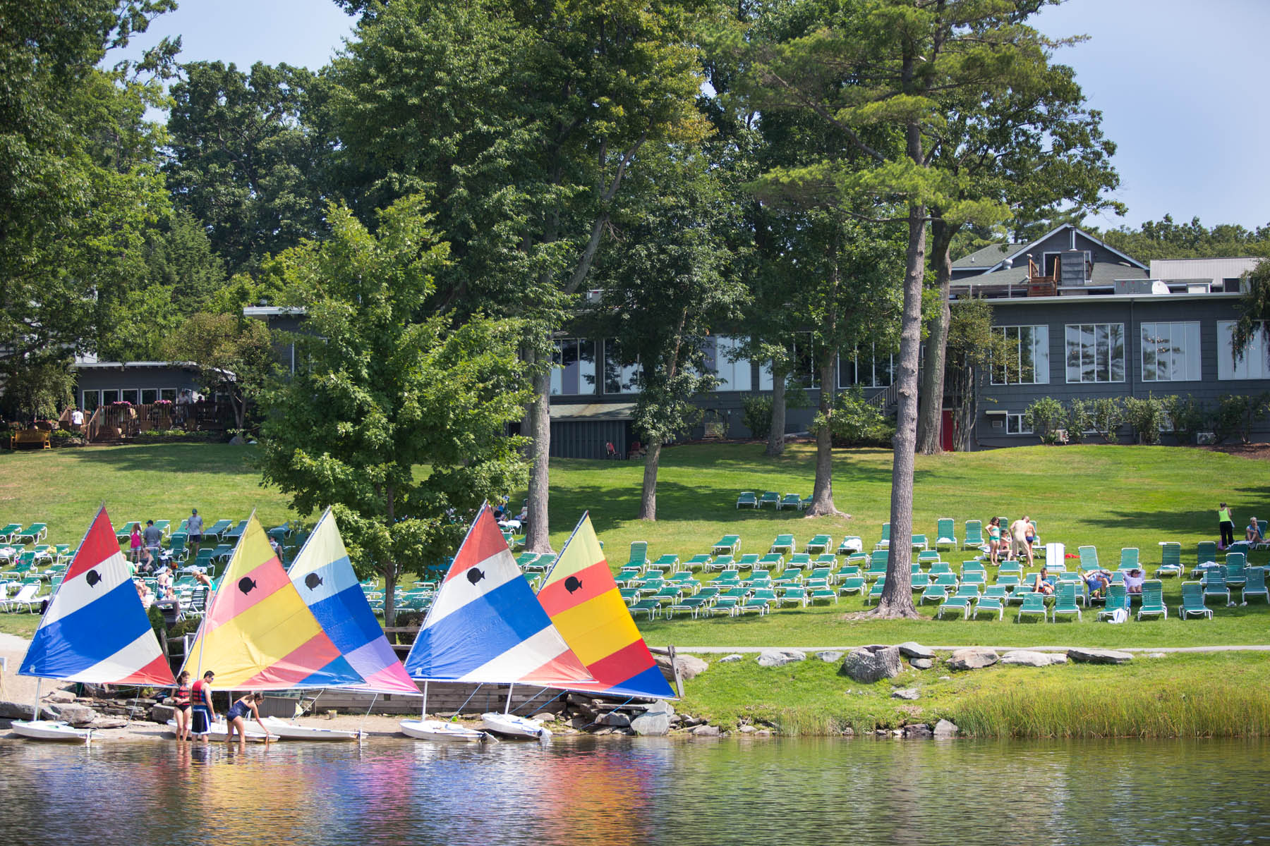 mini sail boats  on the shore