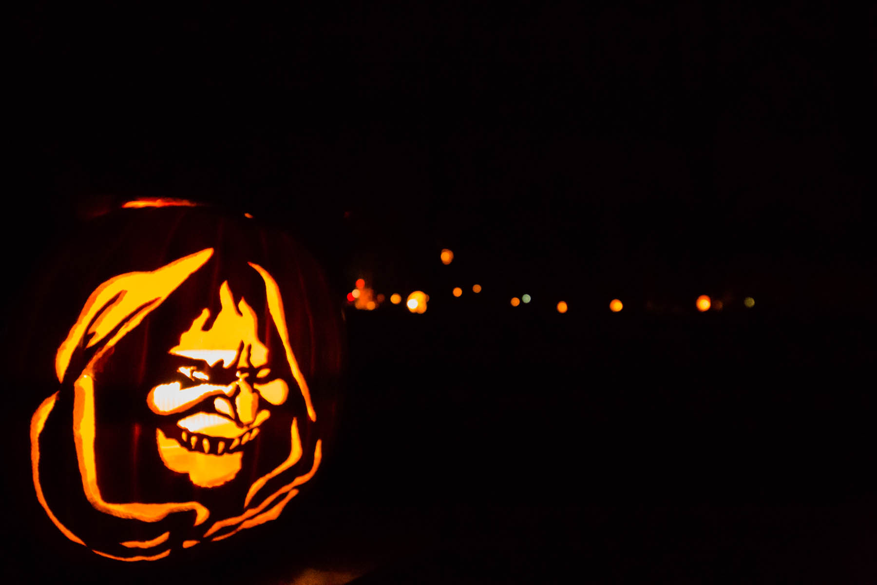 Pumpkin with carved scary face.