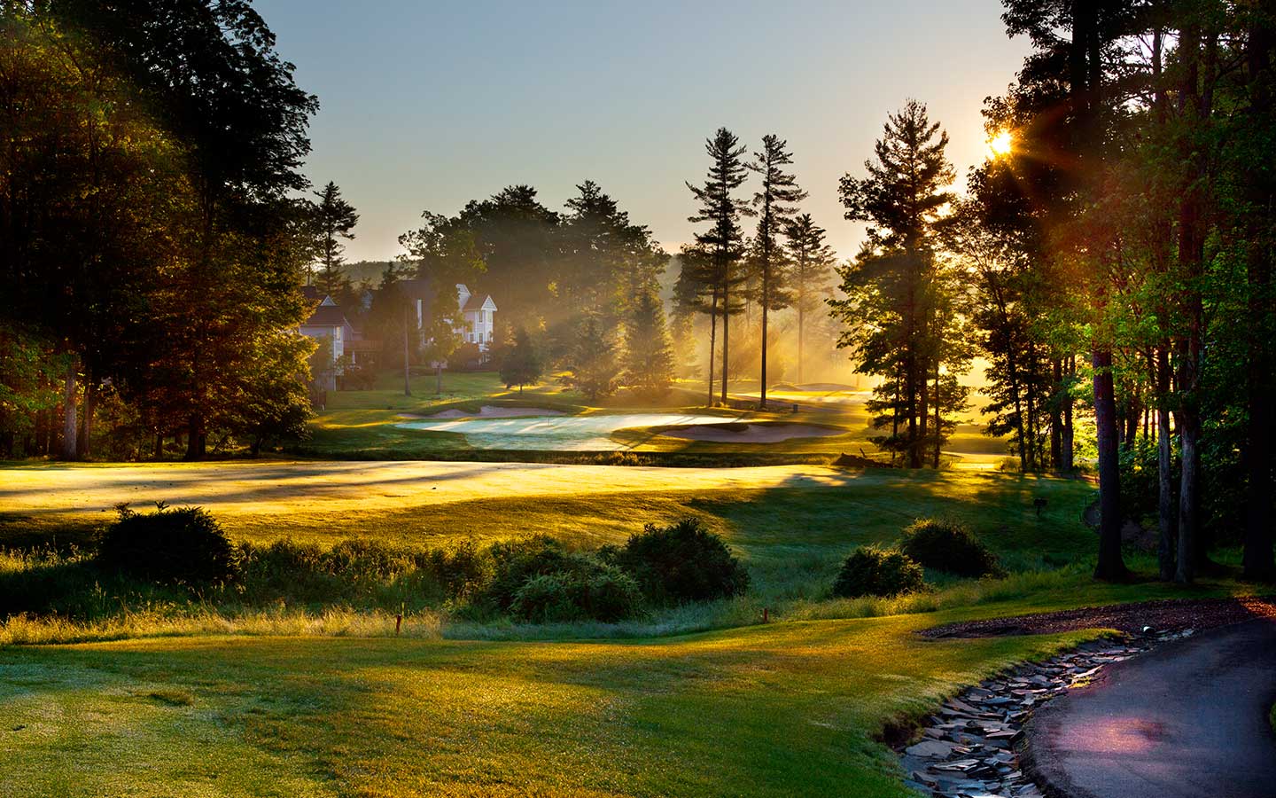 Golf course with morning sunlight.