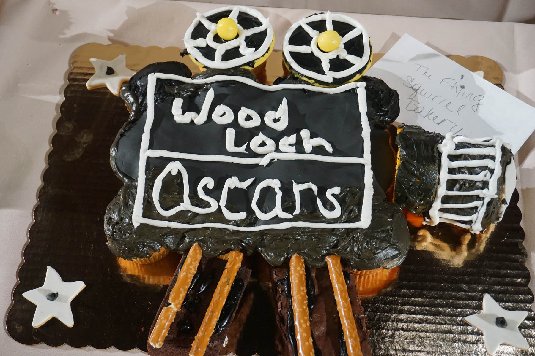 Motion picture camera cake. Text: Woodloch Oscars.
