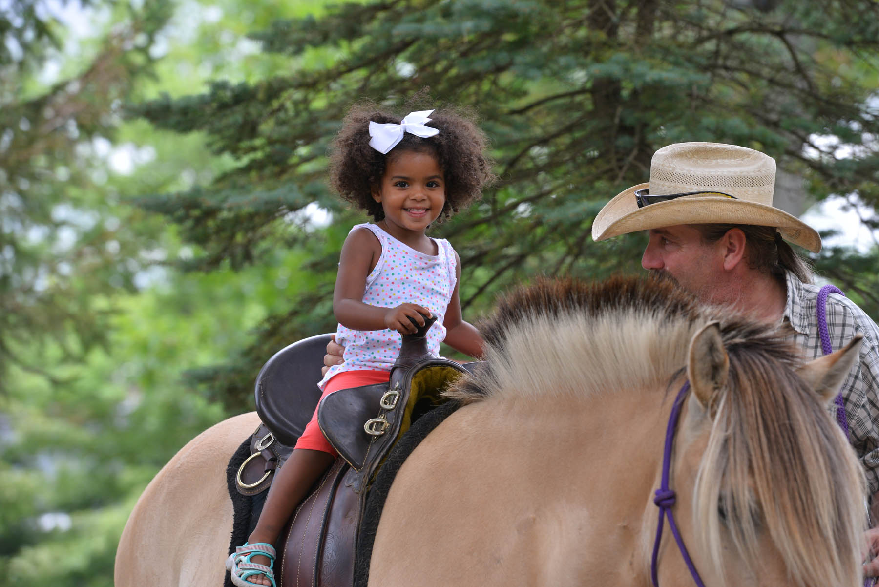 Little girl on a pony.