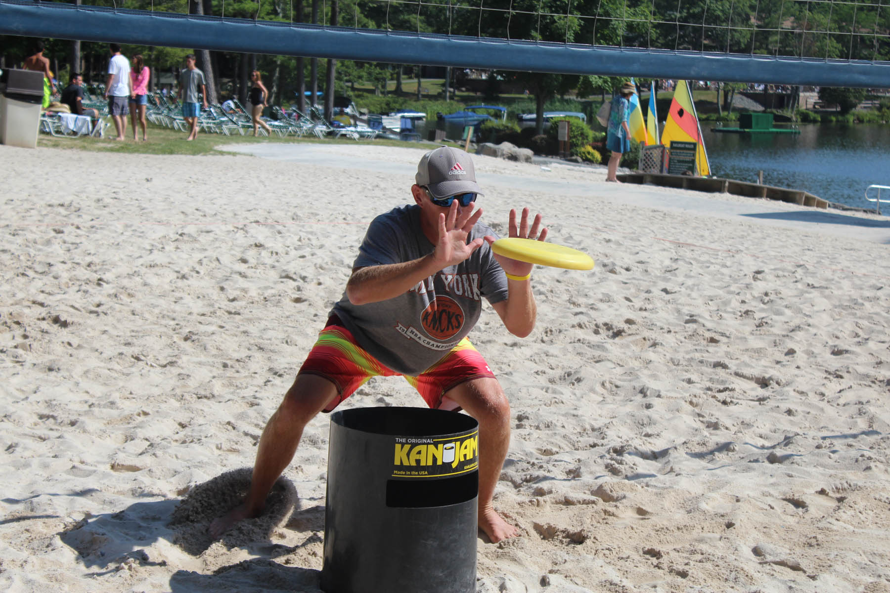 Man catching a frisbee.