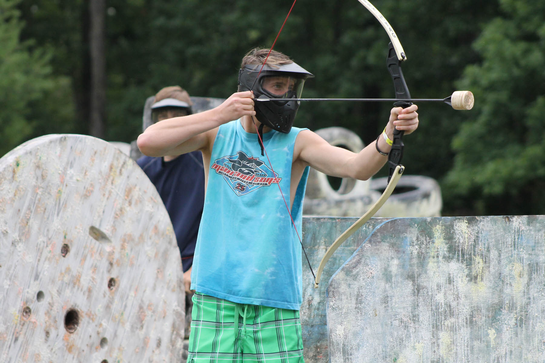 Man aiming safe bow and arrow.