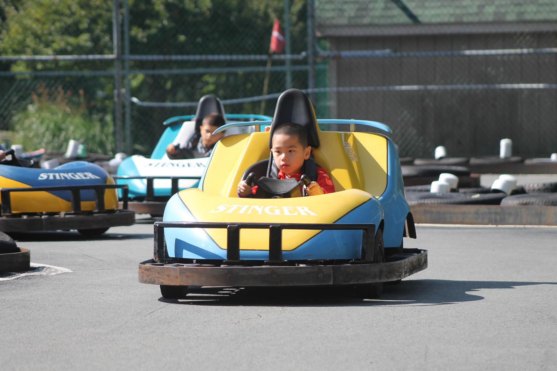 Young boy in a gokart.