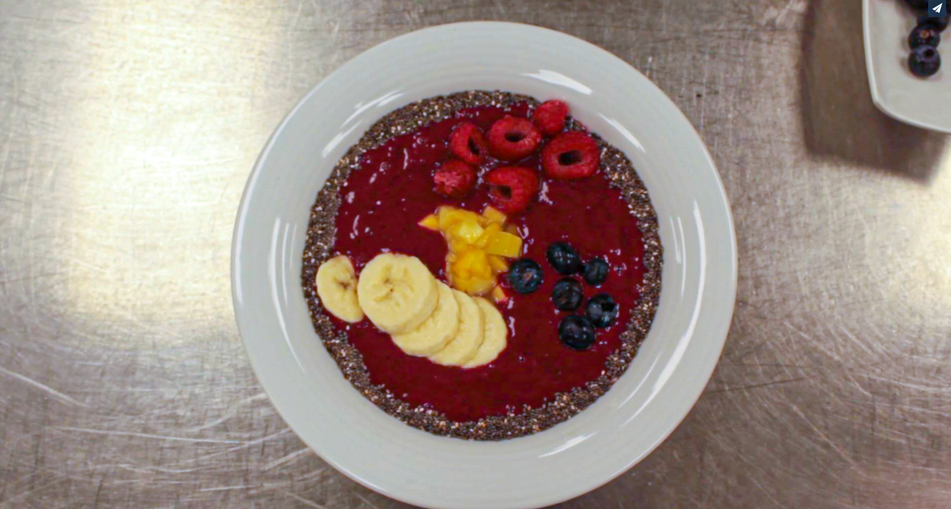 Fruit in a smoothie sauce and bowl.