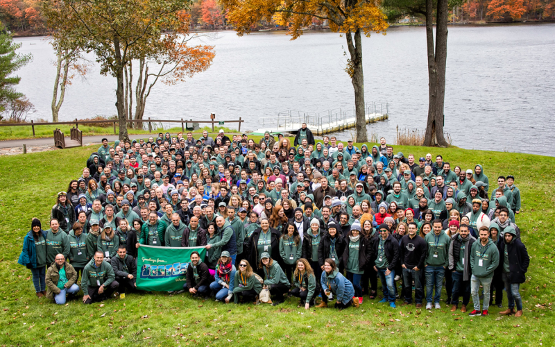 Seatgeek corporate retreat group photo outdoors.