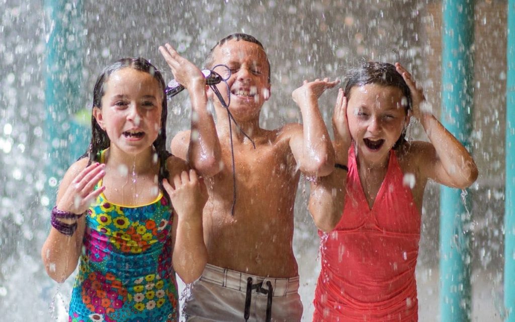 Kids in a splash pool.