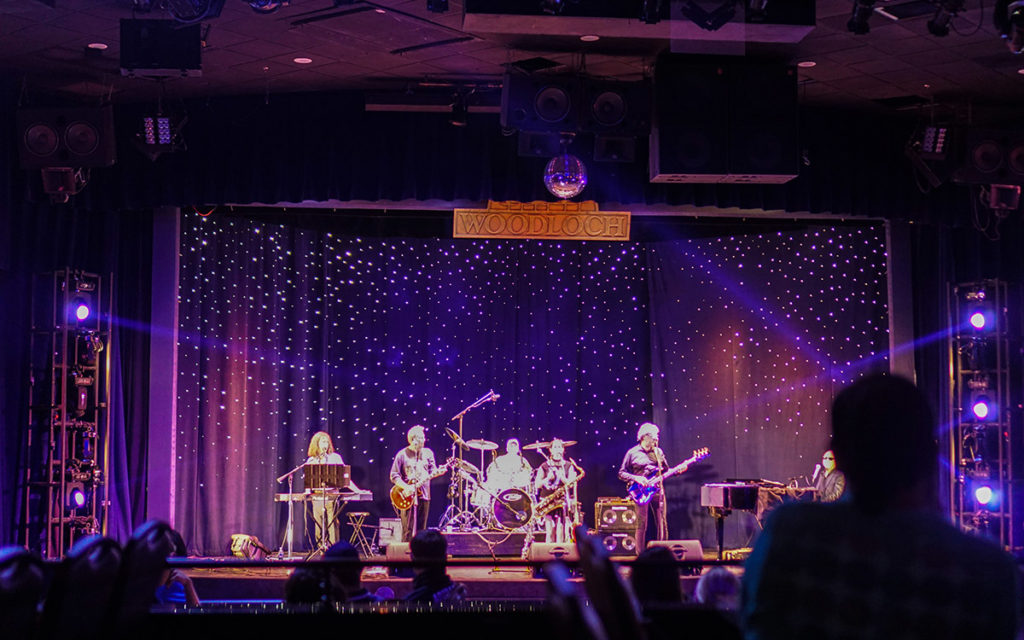 Band performing on stage.