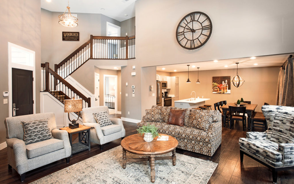 Vacation home living room, dining room, kitchen and staircase.