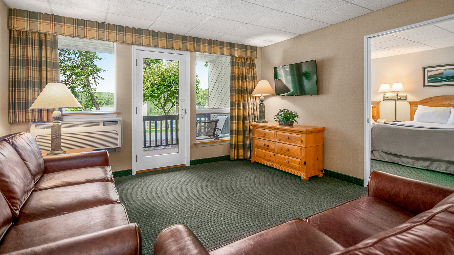 Edgewater living room and door to bedroom.