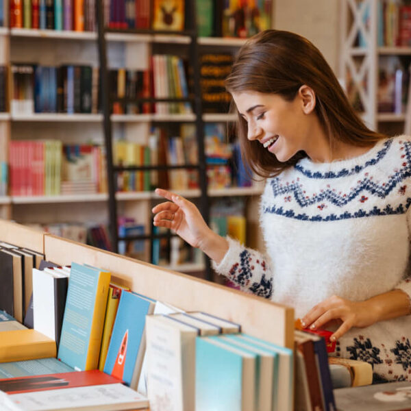 A woman shopping at a bookstore in the Poconos.