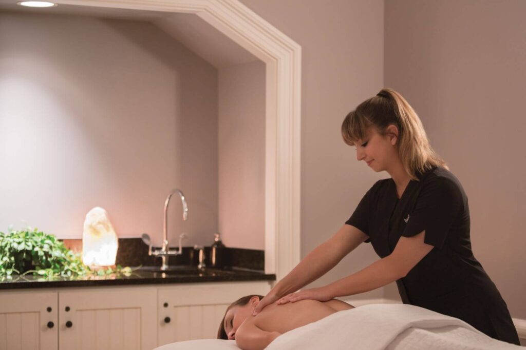 A person getting a massage at a Poconos spa resort.