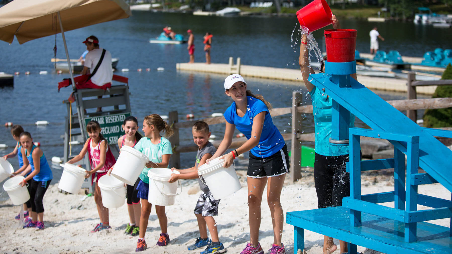 Photo of people enjoying Woodloch summer activities during the annual Olympics
