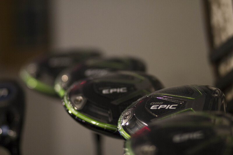 Close up of Epic brand golf clubs.