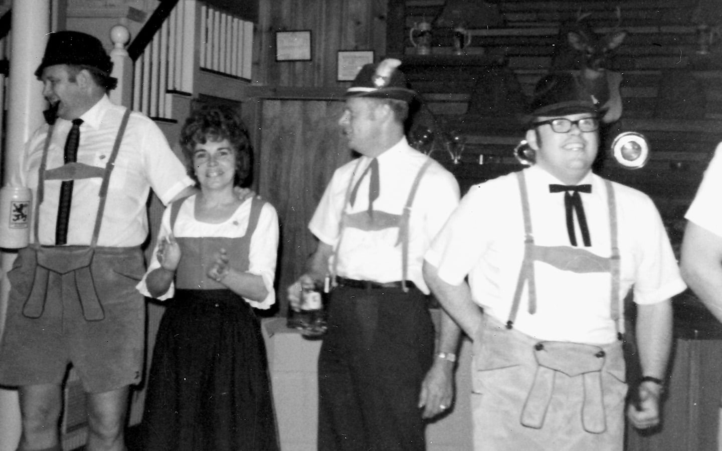 Historic photo of men and women in German costumes.